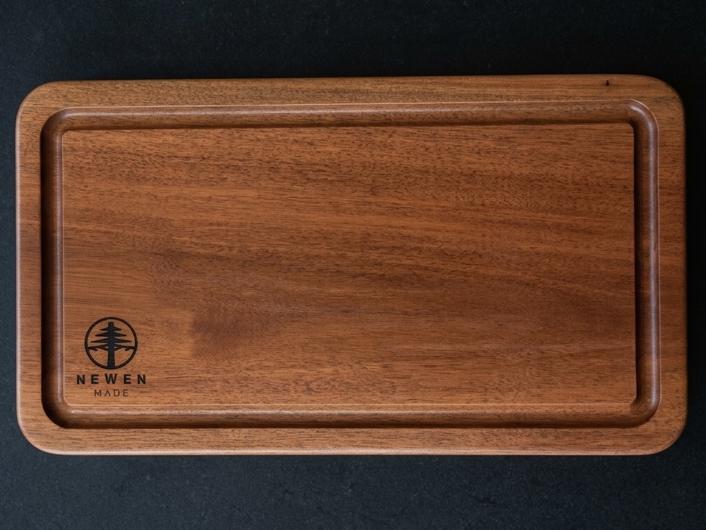 Mylady cutting board with juice groove and Newen Made logo